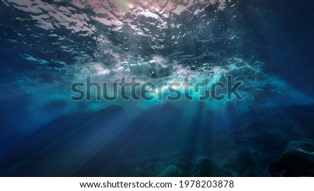 Artistic underwater photo of waves. From a scuba dive at the Canary Islands in the Atlantic Ocean. Spain.