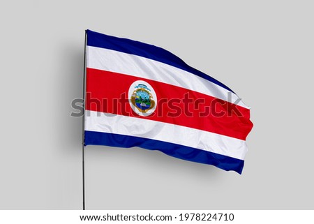 Costa Rica flag isolated on white background with clipping path. close up waving flag of Costa Rica. flag symbols of Costa Rica. Costa Rica flag frame with empty space for your text.