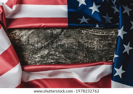 American flag on an old wooden background. Template for American Independence Day, Memorial Day or President's Day