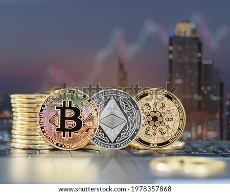 Bitcoin BTC cryptocurrency coin with altcoin digital crypto currency tokens, ETH Ethereum, ADA Cardano for defi decentralized financial banking p2p global investment financial tech business market  Royalty-Free Stock Photo #1978357868