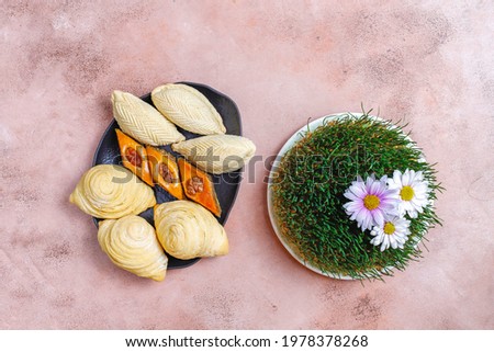 Traditional Azerbaijan holiday Novruz sweets,shekerbura,qogal,baklava, and semeni.