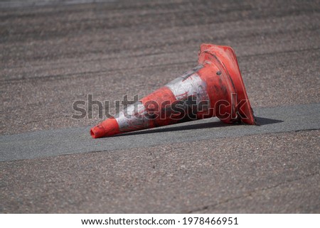 Background with traffic cone on road track Royalty-Free Stock Photo #1978466951
