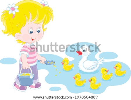 Little girl farmer standing with a bucket of feed grain and feeding a merry brood of small yellow ducklings and a cute white duck on a small pond in a village, vector cartoon illustration