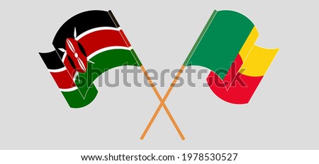 Crossed and waving flags of Kenya and Benin