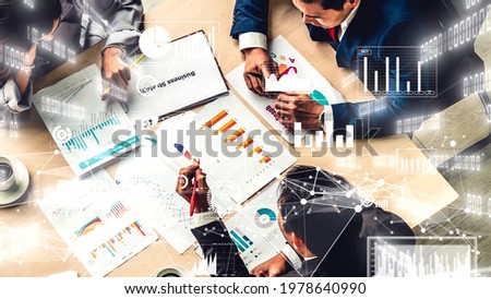 Creative visual of business people in corporate staff meeting . Concept of digital technology for marketing data analysis and investment decision making .