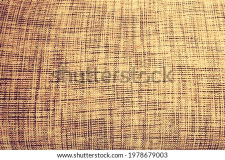 textured bakground of yellow fabric for interior design