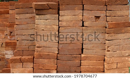 neatly arranged bricks.  Orange brick is suitable for baground
