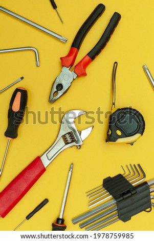 tools on isolated yellow background