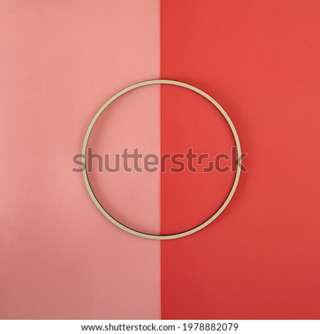 white circle frame on the bright and bold pink background. minimal flat lay. creative modern summer decoration idea