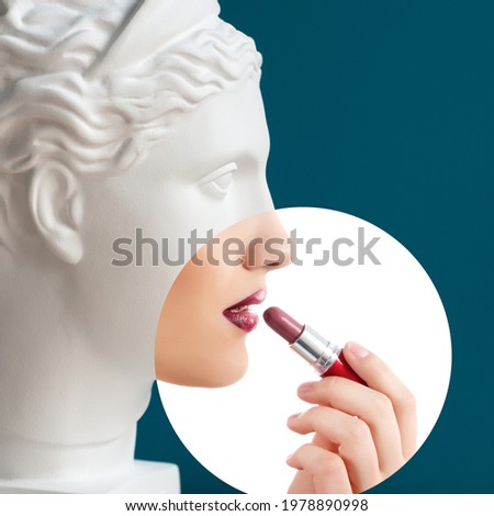 Contemporary collage of plaster statue head and young woman with lipstick in profile over deep blue background. Antiquity and modernity, beauty canons Royalty-Free Stock Photo #1978890998