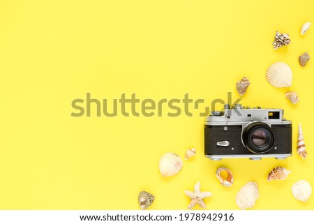 Flat lay travel accessories on yellow background with blank space for text. The concept of a summer holiday at sea. vacation. Summer background.