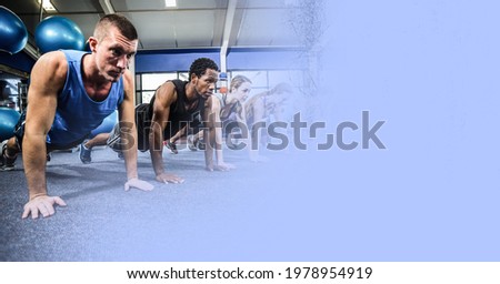 Composition of fit men and woman doing press ups in gym with blue blur. sport, fitness and active lifestyle concept digitally generated image.