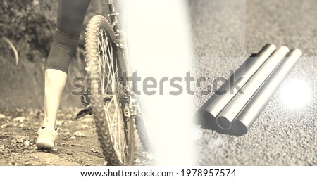 Composition of low section of cyclist with overexposure and metal pipes on road in sepia tone. sport, fitness and active leisure concept digitally generated image.