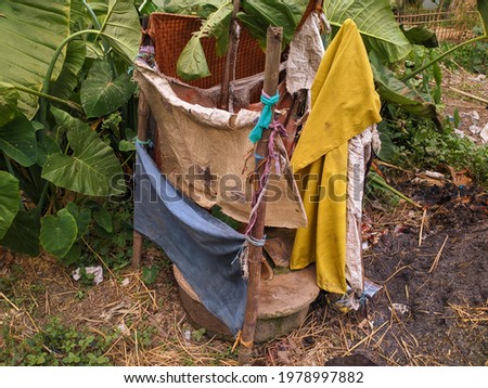 Unhealthy and unhygienic toilet system for the poor people of Bangladesh. World toilet day. Bangladesh poor family. Undevelopment concept. Family. Morbid. Insanitary. Noxious. Poorly. Toilet. Dirty. Royalty-Free Stock Photo #1978997882