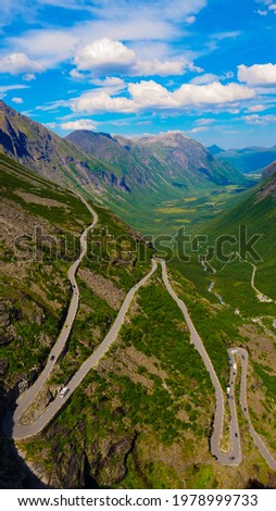 Trolls Path Trollstigen winding scenic mountain road with many cars, Norway Europe. National tourist route.