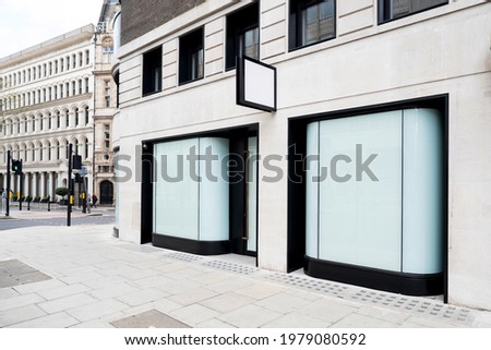 Front view Cafe shop and Restaurant design. Modern Minimal wall concrete black metal white frame mockup Royalty-Free Stock Photo #1979080592