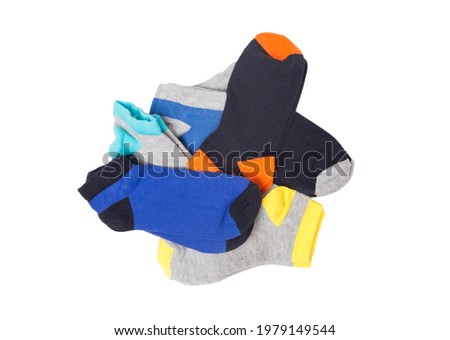 Many colored socks isolated on white background