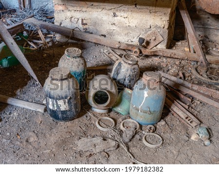 old workshop smith details with rusty tools and stone walls covered in cobweb