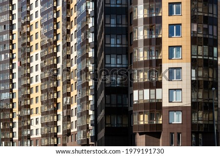 large modern high-rise apartment building. High quality photo