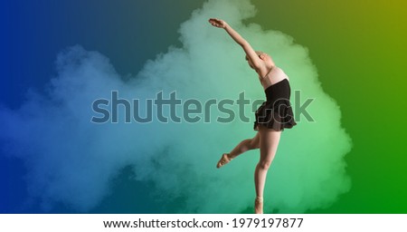 Composition of athletic woman dancing over smoke on colorful background. sport, fitness and active lifestyle concept digitally generated image.