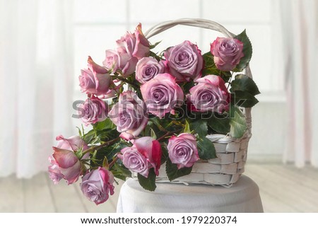 Still life with basket of roses