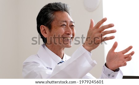 Senior doctor telling good results