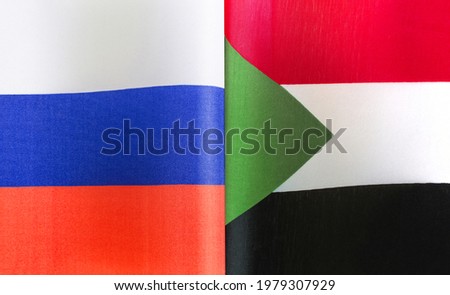 fragments of the national flags of Russia and the Republic of Sudan close-up
