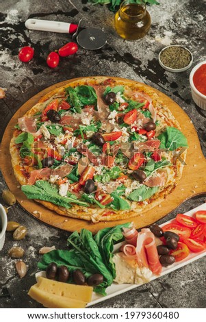 photoshoot of rustic pizzas of different flavors