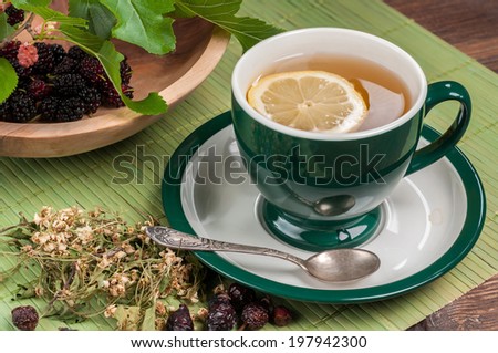 tea with herbs and mulberry