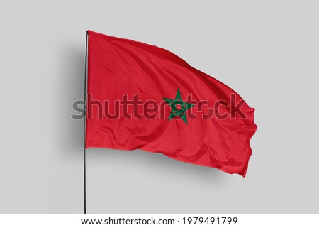 Morocco flag isolated on white background with clipping path. close up waving flag of Morocco. flag symbols of Morocco. Morocco flag frame with empty space for your text. Royalty-Free Stock Photo #1979491799