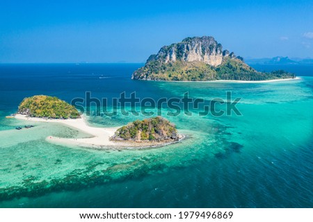 Aerial view from drone of "Thale Waek" (Separated Sea) in Krabi Thailand" This is called the Koh Dam group after its two large members, Koh (island) Dam Hok and Koh Dam Kwan. Royalty-Free Stock Photo #1979496869