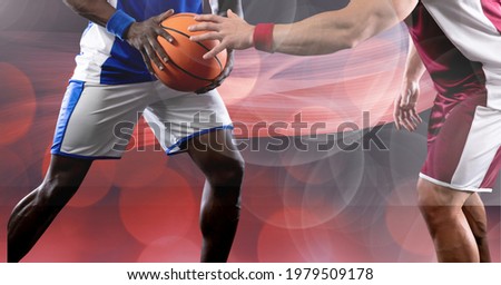 Composition of midsection of basketball players holding ball with copy space. sport and competition concept digitally generated image.