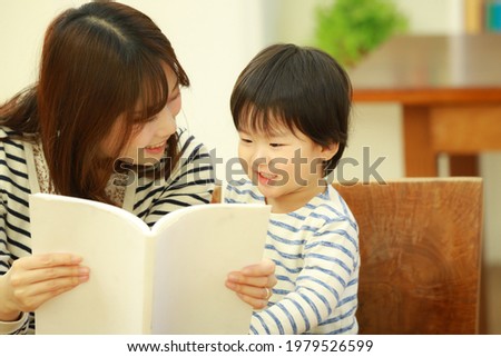 Image of parent and child reading 
