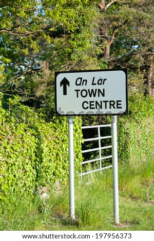 Road sign direction to Town Centre in rural Ireland.