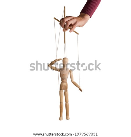 The human hand with marionette on the strings. Concept of control. On white. Royalty-Free Stock Photo #1979569031