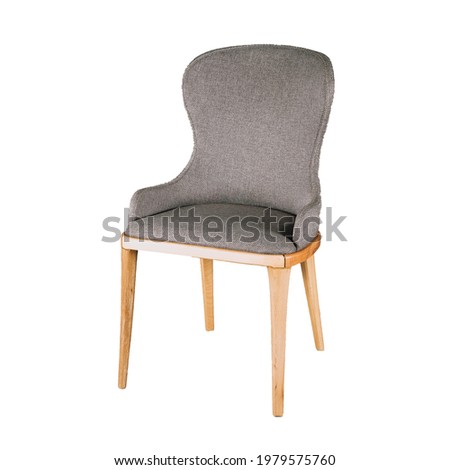 Dark blue navy sapphire color armchair. Modern designer chair on white background. Textile chair.
