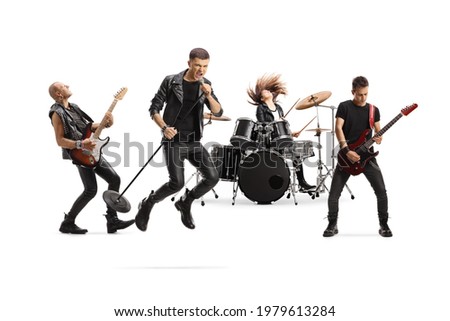 Music band with a male singer jumping with a microphone isolated on white background Royalty-Free Stock Photo #1979613284