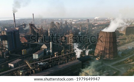 Industry metallurgical plant dawn smoke smog emissions bad ecology aerial photography. Industrial panoramic landmark with blast furnance of metallurgical production. Concept of environmental pollution