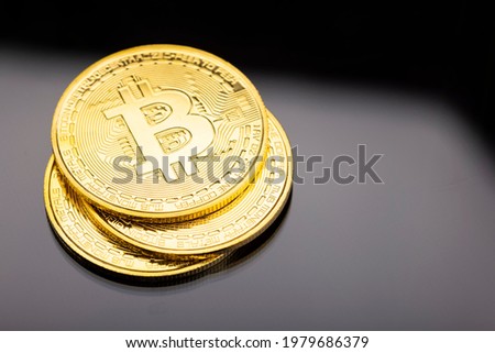Golden bitcoin coins , Crypto currency golden coin business on ิblack background , Digital money