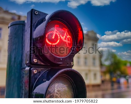 traffic light for bicycles with red light as a sign of prohibited passage closeup