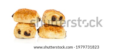 Pains au chocolat (french bakery products with chocolate) isolated on white panoramic background