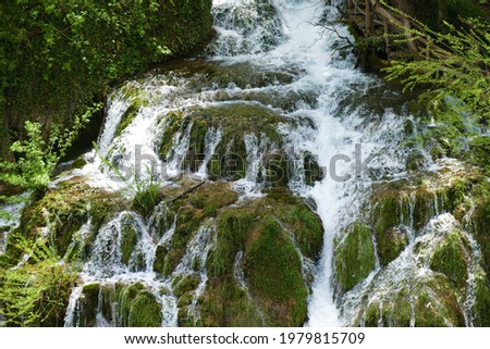 Big waterfalls in green nature