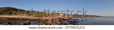 Panoramic photography of the old pier Stella Maris at City and the San Antonio hill at Piriapolis City, Uruguay
