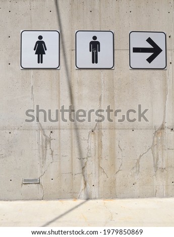 Men and Women's bathroom sign