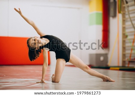 Little girl doing gymnastic classes