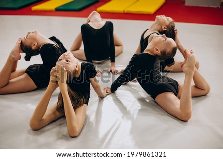 Group of girls doing gymnastic classes
