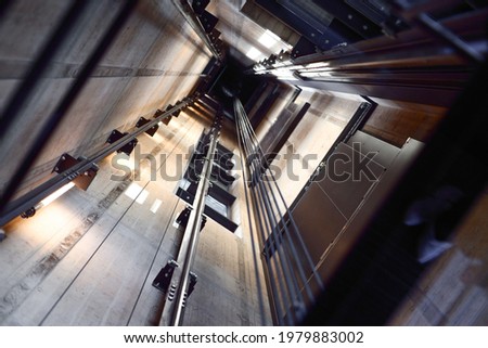 Looking Inside an Elevator Shaft Royalty-Free Stock Photo #1979883002