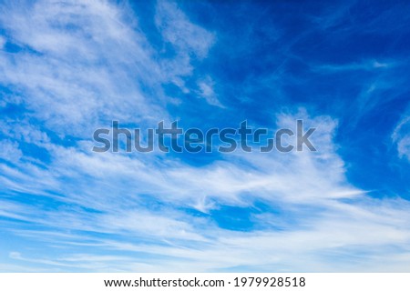 Beautiful clear blue sky with white clouds background. Soft white clouds in the blue sky, high beautiful cloud space weather beautiful blue sky glow clouds background.