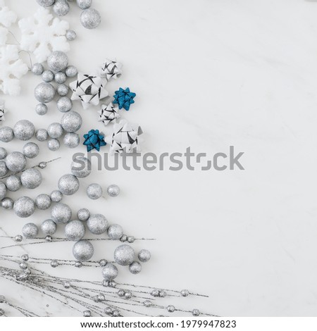 Glittery bauble and snowflakes ornament