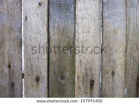 Old wooden fence with paint